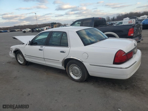 1998 Mercury Grand Marquis GS with VIN 2MEFM74W1WX690968, listed as a Copart auction lot 82848984 with 105,178 mi miles and Salvage Title. Bid and sale history available at carsss.com. Image 2.