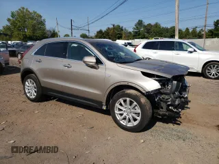 2023 Cadillac XT4 AWD Luxury with VIN 1GYFZBR40PF173861, listed as a Copart auction lot 71233194 with 16,356 mi miles and Salvage title. Bid and sale history available at DreamBid. Image 4.