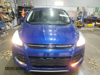 2016 Ford Escape SE with VIN 1FMCU9GX9GUC26772, listed as a Copart auction lot 45337945 with 112,822 mi miles and Salvage Title. Bid and sale history available at DreamBid. Image 5.