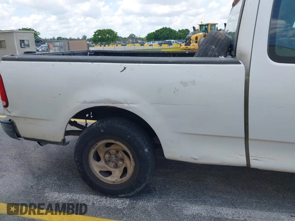 2003 Ford F-150 XL с VIN 1FTRX17253NA21787, выставлен на аукционе IAAI как лот 41963087 с пробегом 317 059 миль миль и . История ставок и продаж доступна на DreamBid. Изображение 12.