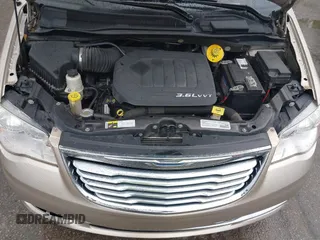 2014 Chrysler Town & Country Touring with VIN 2C4RC1BG7ER208937, listed as a IAAI auction lot 42213347 with 198,077 mi miles and . Bid and sale history available at DreamBid. Image 10.