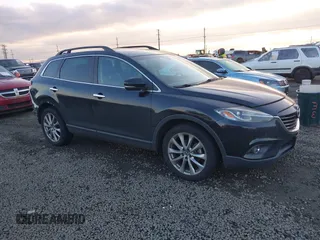 2014 Mazda CX-9 Grand Touring with VIN JM3TB3DV7E0429276, listed as a IAAI auction lot 41415446 with 94,939 mi miles and . Bid and sale history available at DreamBid. Image 1.
