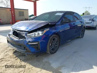 2021 Kia Forte GT-Line z VIN 3KPF34AD2ME386931, wystawiony jako IAAI lot #42333561 z przebiegiem 83 689 mil mil oraz . Historia ofert i sprzedaży dostępna na DreamBid. Obrazek 2.
