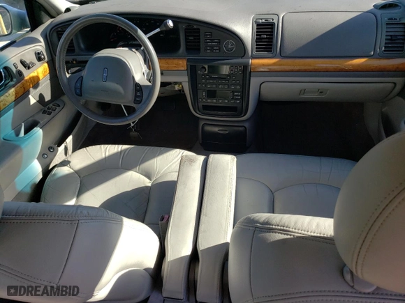 2001 Lincoln Continental with VIN 1LNHM97V31Y641106, listed as a Copart auction lot 77468194 with 86,363 mi miles and Clean Title. Bid and sale history available at carsss.com. Image 8.