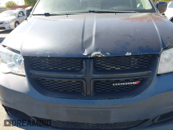 2014 Dodge Grand Caravan SE with VIN 2C4RDGBGXER254634, listed as a IAAI auction lot 42149494 with 158,614 mi miles and . Bid and sale history available at DreamBid. Image 6.