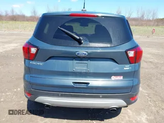 2019 Ford Escape SE z VIN 1FMCU9GDXKUC06609, wystawiony jako IAAI lot #42061974 z przebiegiem 148 064 mil mil oraz . Historia ofert i sprzedaży dostępna na DreamBid. Obrazek 16.