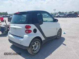 2009 Smart fortwo Pure with VIN WMEEJ31XX9K302737, listed as a IAAI auction lot 42124550 with 43,610 mi miles and . Bid and sale history available at DreamBid. Image 4.