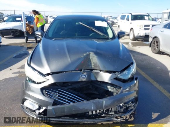 2018 Ford Fusion SE z VIN 3FA6P0H70JR191384, wystawiony jako IAAI lot #41340319 z przebiegiem 89 581 mil mil oraz . Historia ofert i sprzedaży dostępna na DreamBid. Obrazek 12.