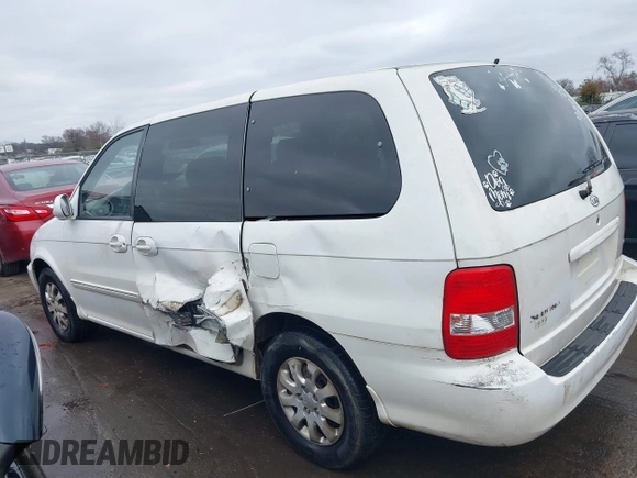 2004 Kia Sedona LX with VIN KNDUP131446537660, listed as a IAAI auction lot 41526183 with 282,891 mi miles. Bid and sale history available at carsss.com. Image 14.
