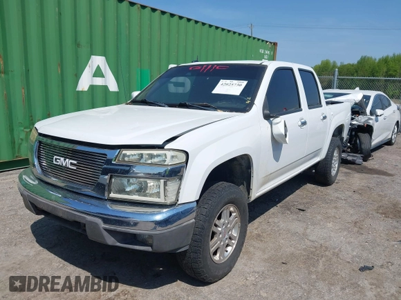 2012 GMC Canyon SLE2 with VIN 1GTH6PFE7C8117206, listed as a IAAI auction lot 42025730 with 171,777 mi miles and . Bid and sale history available at DreamBid. Image 2.