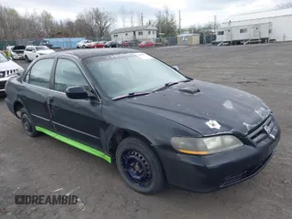 2002 Honda Accord LX with VIN 1HGCG56462A129407, listed as a IAAI auction lot 42074892 with 229,243 mi miles and . Bid and sale history available at DreamBid. Image 1.