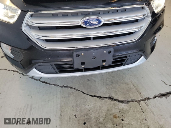 2019 Ford Escape Titanium with VIN 1FMCU9J96KUA01051, listed as a IAAI auction lot 42841649 with 69,720 mi miles and . Bid and sale history available at DreamBid. Image 24.