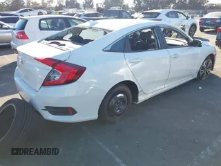 2017 Honda Civic EX-T with VIN 19XFC1E38HE002205, listed as a IAAI auction lot 40891678 with 10,398 mi miles and . Bid and sale history available at DreamBid. Image 4.