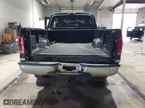 2003 Ford Super Duty F-250 XL with VIN 1FTNX21P33EC45388, listed as a Copart auction lot 48055425 with 0 mi miles and Salvage Title. Bid and sale history available at carsss.com. Image 6.