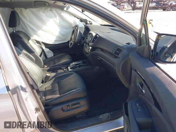 2019 Honda Pilot Elite with VIN 5FNYF6H00KB001016, listed as a IAAI auction lot 42583325 with 133,327 mi miles and . Bid and sale history available at DreamBid. Image 5.