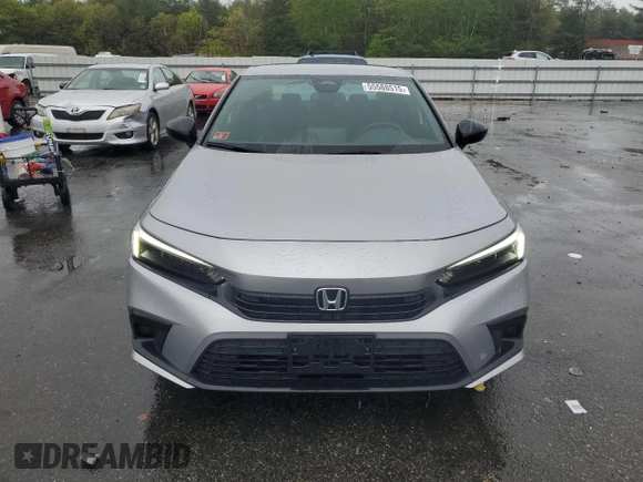 2022 Honda Civic Sport z VIN 2HGFE2F57NH597601, wystawiony jako Copart lot #55588515 z przebiegiem 12 576 mil mil oraz Szkoda całkowita • Salvage title. Historia ofert i sprzedaży dostępna na DreamBid. Obrazek 5.