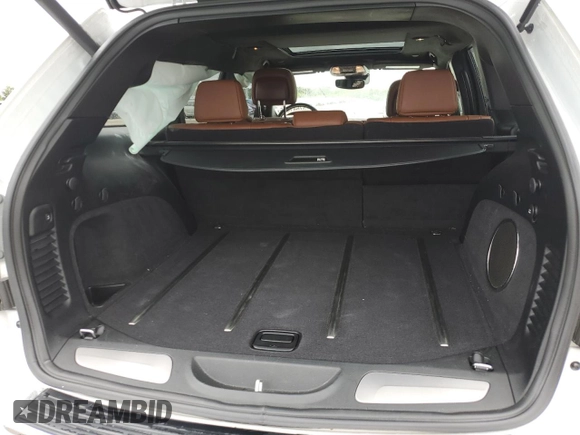 2017 Jeep Grand Cherokee Summit with VIN 1C4RJFJG2HC941155, listed as a Copart auction lot 57641665 with 72,273 mi miles and Salvage title. Bid and sale history available at DreamBid. Image 6.