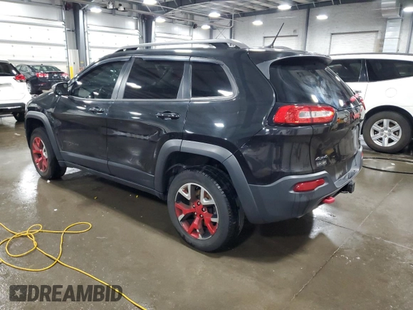 2015 Jeep Cherokee Trailhawk with VIN 1C4PJMBS5FW587545, listed as a Copart auction lot 58820685 with 136,755 mi miles and Salvage title. Bid and sale history available at DreamBid. Image 2.