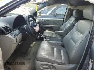 2007 Honda Odyssey EX-L with VIN 5FNRL38657B059033, listed as a Copart auction lot 54005495 with 212,674 mi miles and Salvage Title. Bid and sale history available at DreamBid. Image 7.