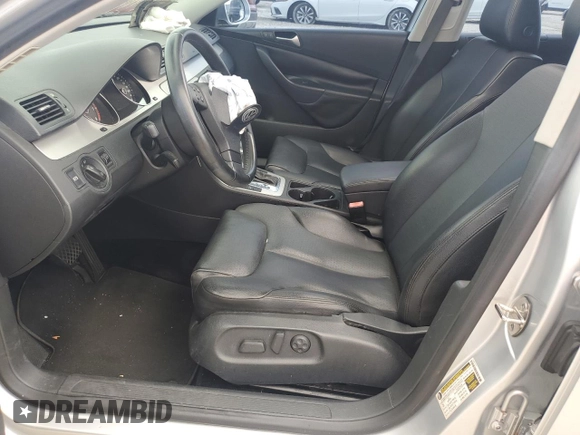 2009 Volkswagen Passat Komfort with VIN WVWXK73C09E140427, listed as a Copart auction lot 60374115 with 113,923 mi miles and Salvage title. Bid and sale history available at DreamBid. Image 7.