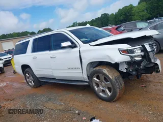 2017 Chevrolet Suburban Premier z VIN 1GNSCJKCXHR204770, wystawiony jako IAAI lot #42262898 z przebiegiem 166 304 mil mil oraz . Historia ofert i sprzedaży dostępna na DreamBid. Obrazek 13.