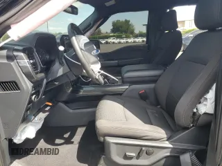 2023 Ford F-150 XL with VIN 1FTEW1C59PFC47929, listed as a Copart auction lot 57086585 with 68,472 mi miles and Salvage title. Bid and sale history available at DreamBid. Image 7.