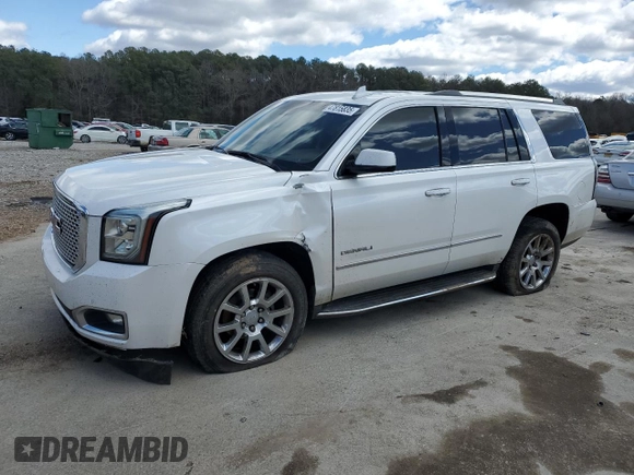 2016 GMC Yukon Denali with VIN 1GKS1CKJ4GR180185, listed as a Copart auction lot 47815835 with 197,506 mi miles and Salvage Title. Bid and sale history available at DreamBid. Image 1.