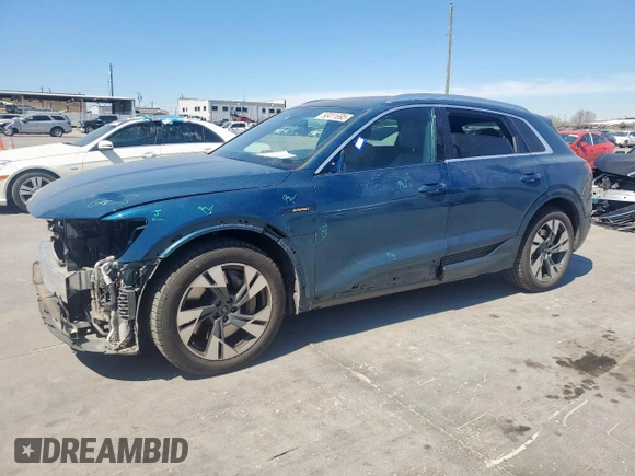 2021 Audi e-tron Premium Plus with VIN WA1LAAGE5MB030598, listed as a Copart auction lot 50411695 with 31,819 mi miles and Salvage title. Bid and sale history available at DreamBid. Image 1.