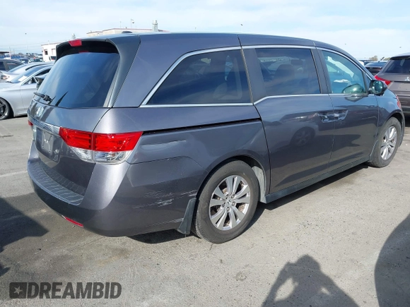 2014 Honda Odyssey EX-L with VIN 5FNRL5H64EB055807, listed as a IAAI auction lot 41760758 with 144,346 mi miles and . Bid and sale history available at carsss.com. Image 4.