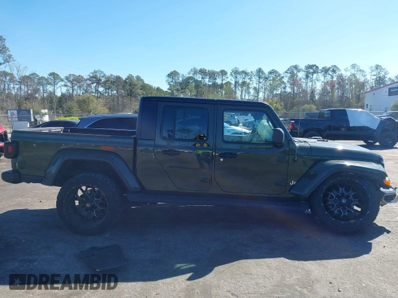 2022 Jeep Gladiator High Altitude with VIN 1C6HJTFG3NL141891, listed as a IAAI auction lot 41738578 with 38,133 mi miles and . Bid and sale history available at DreamBid. Image 12.