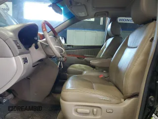 2010 Toyota Sienna XLE with VIN 5TDDK4CC7AS028210, listed as a Copart auction lot 65343295 with 172,206 mi miles and Clean title. Bid and sale history available at DreamBid. Image 7.