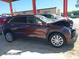 2022 Cadillac XT4 FWD Luxury with VIN 1GYAZAR42NF162880, listed as a IAAI auction lot 41850951 with 47,344 mi miles and . Bid and sale history available at carsss.com. Image 13.