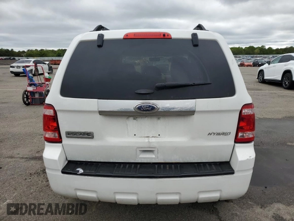 2011 Ford Escape Hybrid with VIN 1FMCU4K30BKB66313, listed as a Copart auction lot 58771165 with 297,214 mi miles and Salvage title. Bid and sale history available at DreamBid. Image 6.