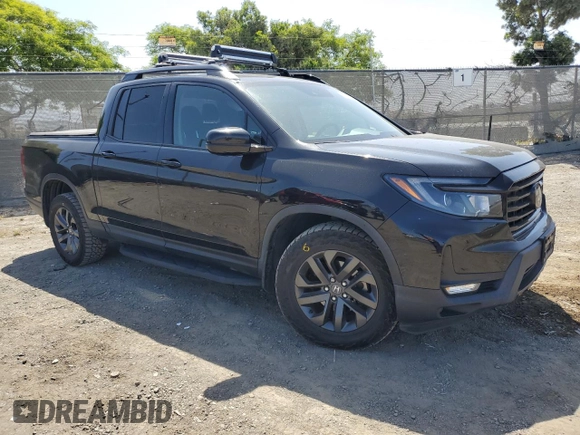 2021 Honda Ridgeline Sport with VIN 5FPYK3F18MB006111, listed as a Copart auction lot 57152215 with 80,954 mi miles and Salvage title. Bid and sale history available at DreamBid. Image 4.