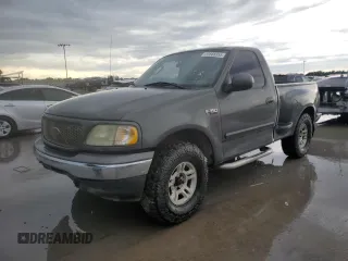2003 Ford F-150 XL with VIN 1FTRF17263NA29013, listed as a Copart auction lot 55668355 with 202,416 mi miles and Salvage title. Bid and sale history available at DreamBid. Image 1.