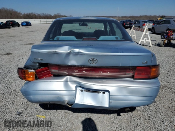 1992 Toyota Camry LE with VIN 4T1SK12E7NU001465, listed as a Copart auction lot 46937175 with 141,334 mi miles and Salvage Title. Bid and sale history available at carsss.com. Image 6.