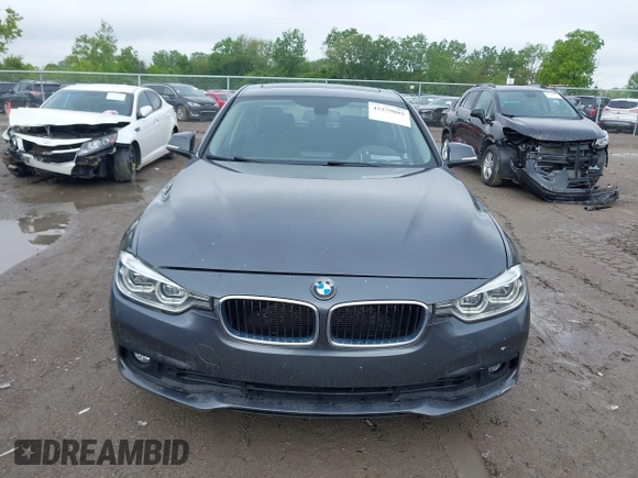 2018 BMW 3 Series 320i xDrive with VIN WBA8A3C5XJA505917, listed as a IAAI auction lot 42279882 with 89,537 mi miles and . Bid and sale history available at DreamBid. Image 12.