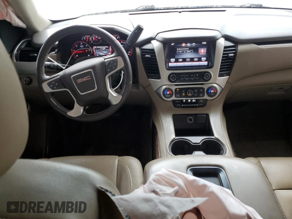 2015 GMC Yukon SLE with VIN 1GKS1AKC5FR120713, listed as a Copart auction lot 48009325 with 133,372 mi miles and Salvage Title. Bid and sale history available at carsss.com. Image 8.