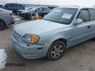 2005 Hyundai Accent GLS with VIN KMHCG45C65U576092, listed as a IAAI auction lot 41368504 with 162,208 mi miles. Bid and sale history available at carsss.com. Image 6.