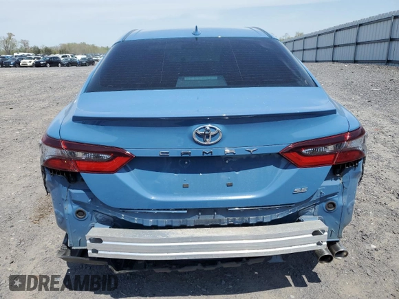 2023 Toyota Camry SE with VIN 4T1G11AK4PU095808, listed as a Copart auction lot 52798085 with 34,266 mi miles and Salvage Title. Bid and sale history available at DreamBid. Image 6.