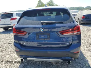 2021 BMW X1 xDrive28i with VIN WBXJG9C01M5T94314, listed as a Copart auction lot 60244134 with 43,933 mi miles and Salvage title. Bid and sale history available at DreamBid. Image 6.