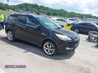 2013 Ford Escape Titanium with VIN 1FMCU9J90DUA01551, listed as a IAAI auction lot 42686247 with 190,707 mi miles and . Bid and sale history available at DreamBid. Image 1.