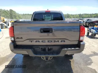 2020 Toyota Tacoma SR z VIN 3TYSZ5AN9LT004270, wystawiony jako Copart lot #55217195 z przebiegiem Nie podano mil oraz Szkoda całkowita • Salvage title. Historia ofert i sprzedaży dostępna na DreamBid. Obrazek 6.