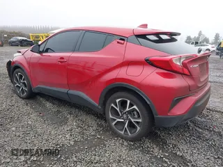 2021 Toyota C-HR LE with VIN JTNKHMBX1M1104530, listed as a IAAI auction lot 41324350 with 53,112 mi miles. Bid and sale history available at carsss.com. Image 3.