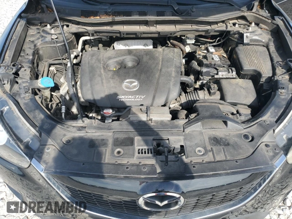 2014 Mazda CX-5 Sport with VIN JM3KE2BE3E0361736, listed as a Copart auction lot 64306405 with 114,468 mi miles and Clean title. Bid and sale history available at DreamBid. Image 12.
