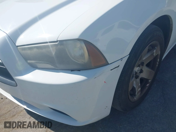 2013 Dodge Charger Police with VIN 2C3CDXAT9DH714055, listed as a IAAI auction lot 42099590 with Not Provided miles and . Bid and sale history available at DreamBid. Image 6.