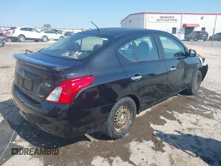 2014 Nissan Versa SV with VIN 3N1CN7AP2EL836604, listed as a IAAI auction lot 40574887 with 105,057 mi miles. Bid and sale history available at carsss.com. Image 4.