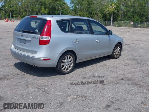 2009 Hyundai Elantra Touring with VIN KMHDC86E99U035163, listed as a IAAI auction lot 42049897 with 123,559 mi miles and . Bid and sale history available at DreamBid. Image 4.