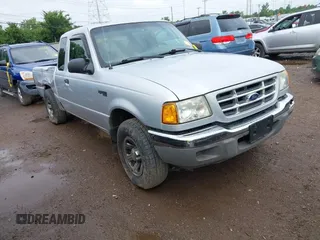 2003 Ford Ranger XLT with VIN 1FTYR44E83TA18805, listed as a IAAI auction lot 42730056 with 163,907 mi miles and . Bid and sale history available at DreamBid. Image 1.