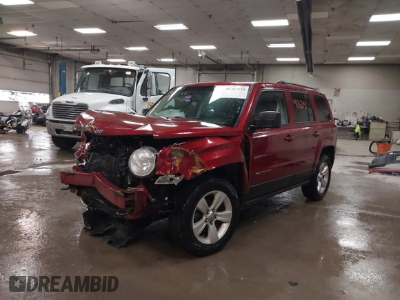 2014 Jeep Patriot Latitude with VIN 1C4NJRFB4ED884900, listed as a IAAI auction lot 41762139 with 131,635 mi miles and . Bid and sale history available at DreamBid. Image 18.